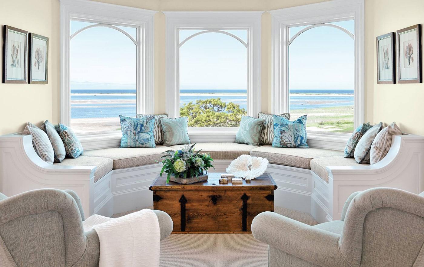 Built in window seat along bay window overlooking the water