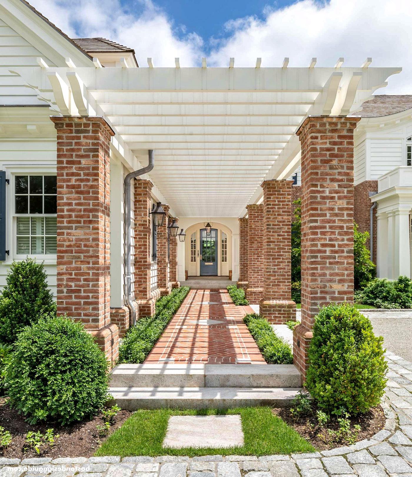 Front entry of home with Pergola overhang