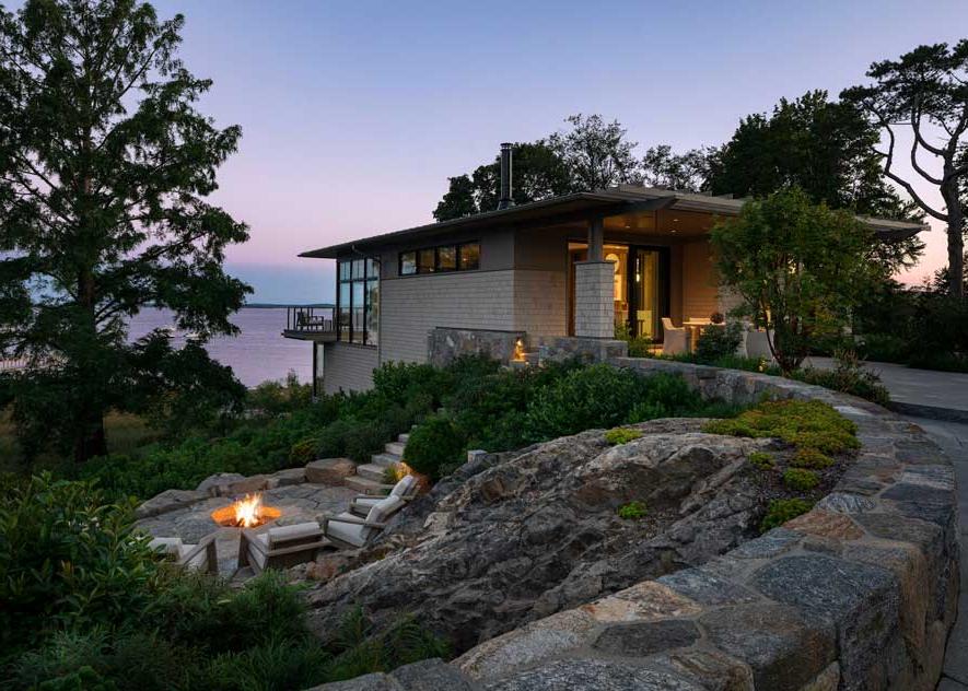 House overlooking the water at dusk