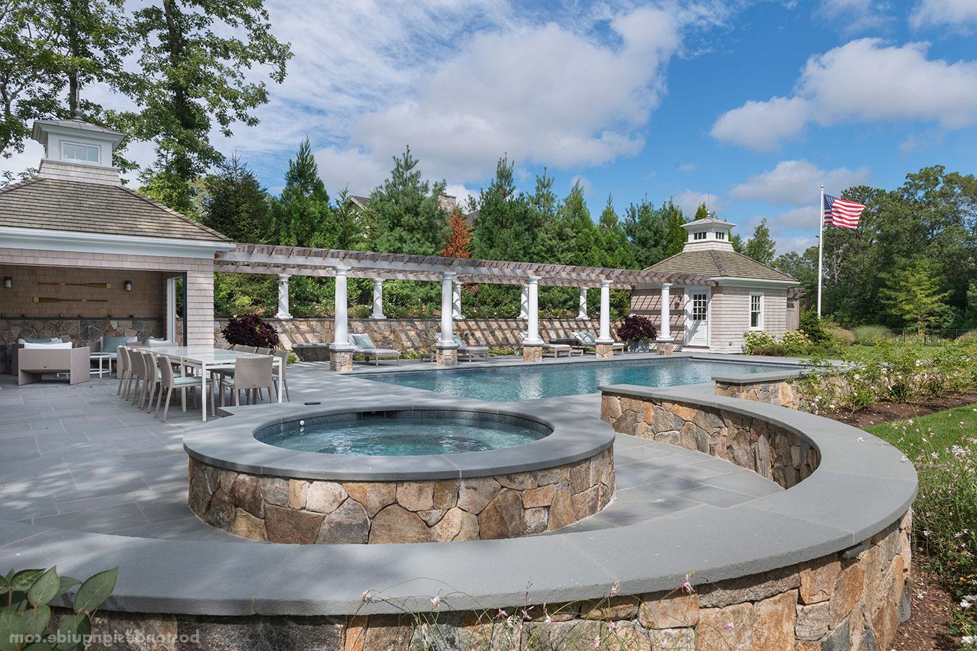 Dual pool house with pergola by Rogers & Marney Builders