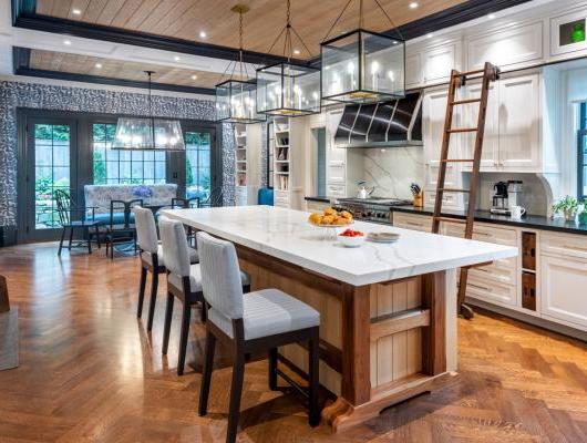 Farmhouse kitchen with big center island and wood ceiling