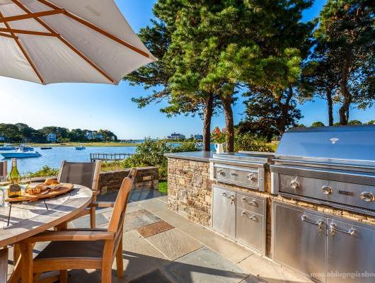 Outdoor kitchen and dining terrace by McPhee Associates of Cape Cod